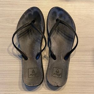 Reef black flip flops size 3